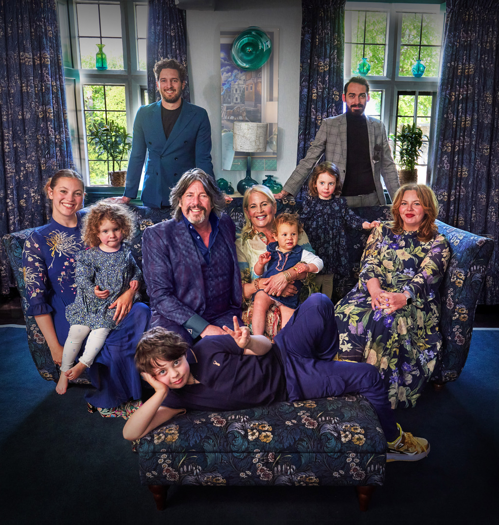 Family portrait in a living room.
